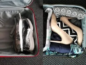 Sports shoes and high heels packed in a suitcase
