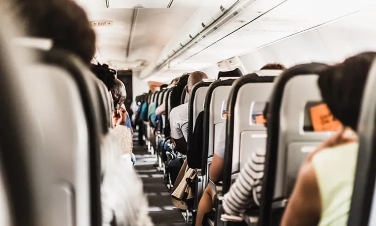 Passengers sitting on an airplane during flight