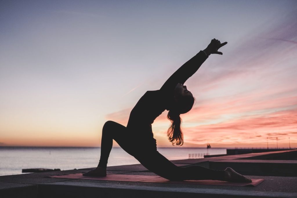 Sitting on a plane for hours can be uncomfortable. Discover our plane yoga stretches to ease tension and improve circulation for a more relaxed flight
