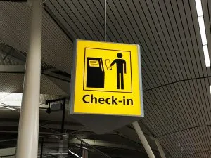 Airport check-in desk sign