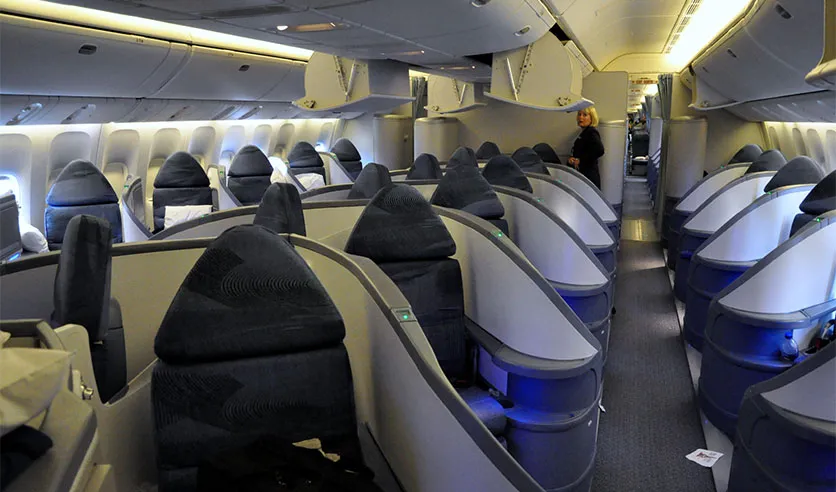 Business class seats inside an airplane