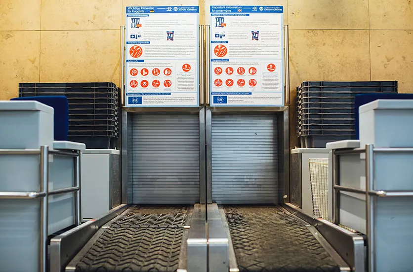 Checked luggage conveyor belts inside an airport