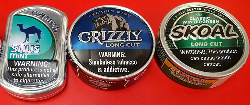 Can You Bring Nicotine Pouches and Chewing Tobacco on Planes? 1 Chewing tobacco snuff cans