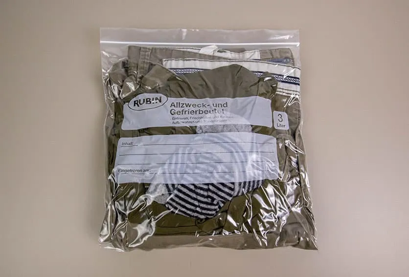 clothes packed in a single ziploc bag for traveling