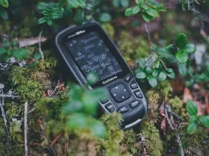 Garmin GPS navigation SOS device in the woods