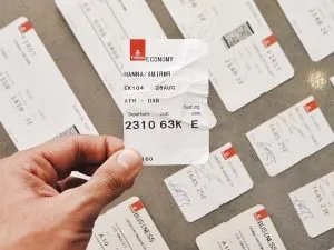 Man holding airline tickets