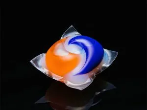 Tide laundry detergent pod black background