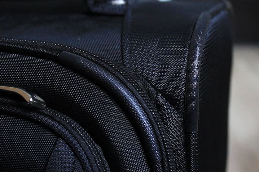 Travelpro Maxlite 5 black polyester fabric close-up